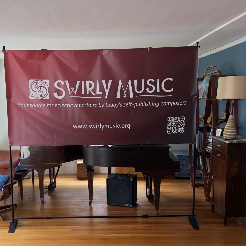 Trade show booth banner for Swirly Music set up at home in the living room.