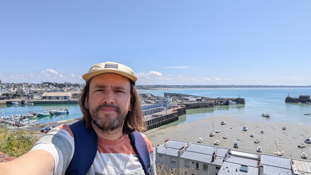 A selfie with a view of the tranquil fishing commune of Granville