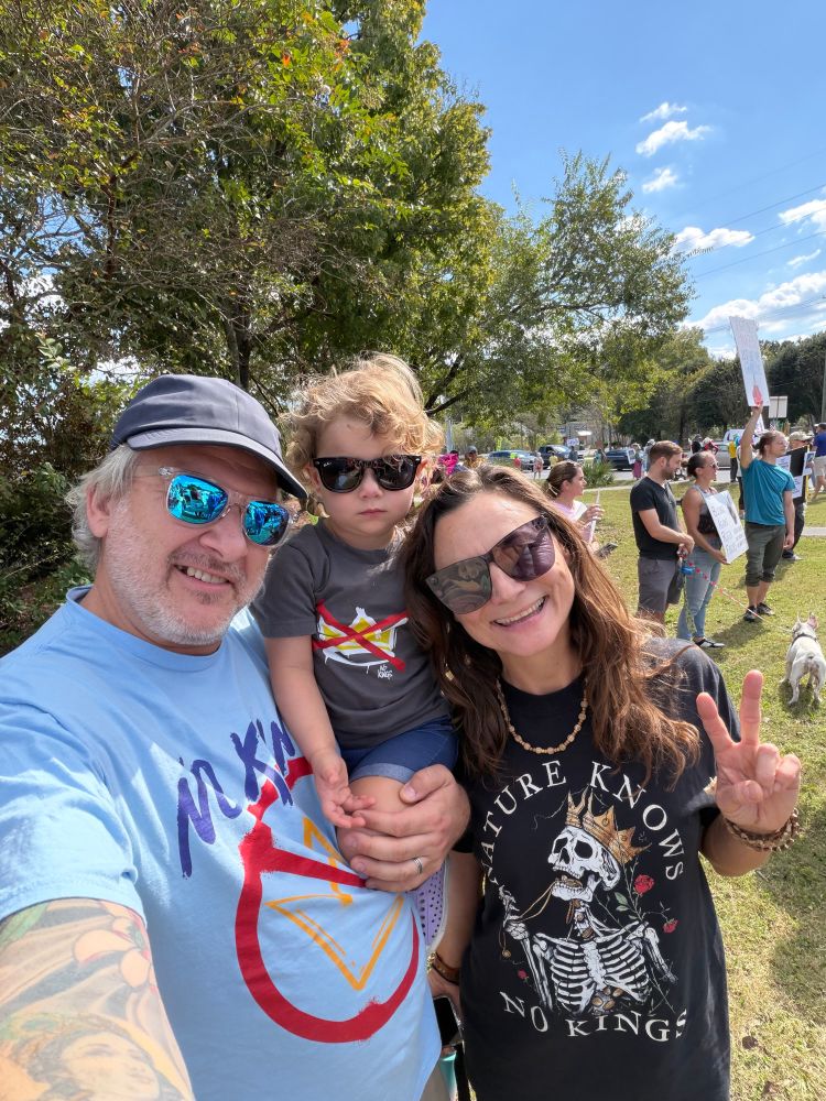 Bram, his wife, and daughter at No Kings protest 