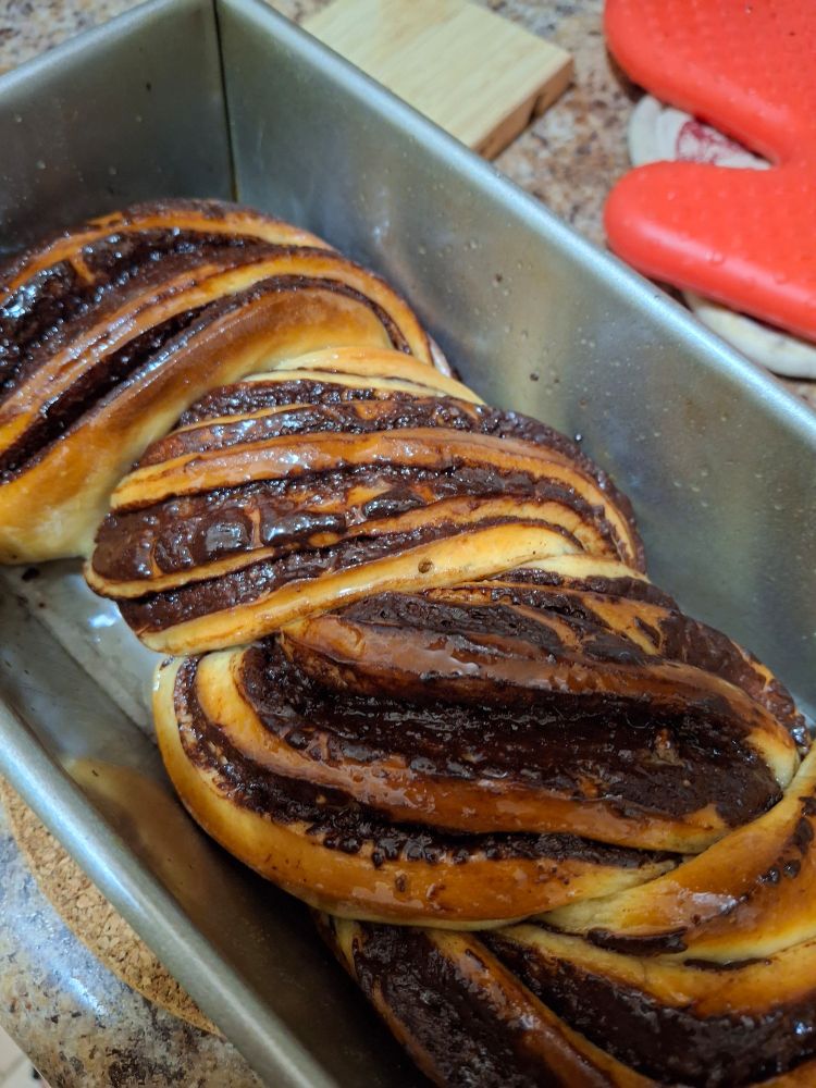 A delicious looking freshly baked chocolate babka.
