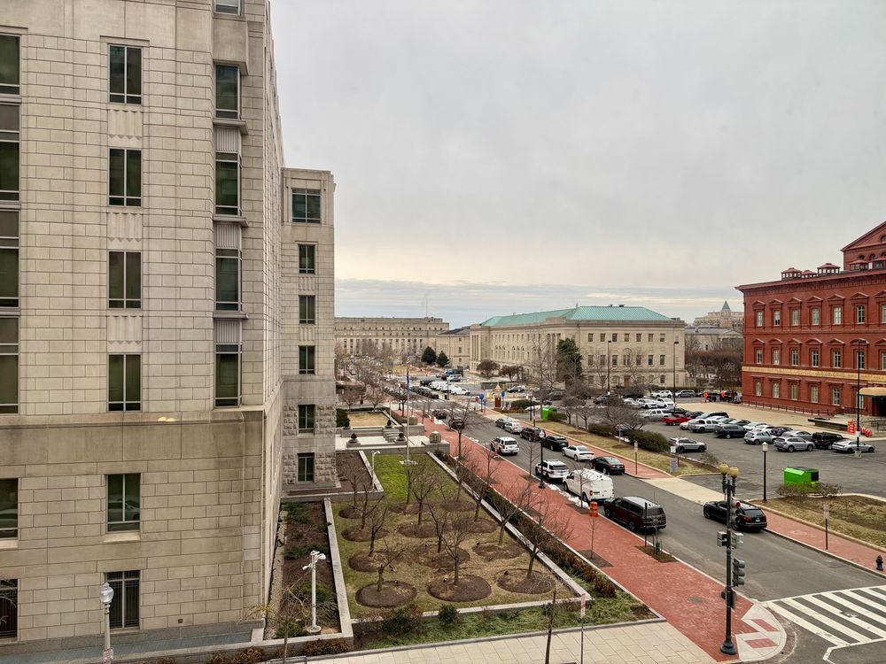 View from the Arlo hotel on G street in DC in February. The building across the street was an FBI building. The streets were quiet. The city was peaceful. 