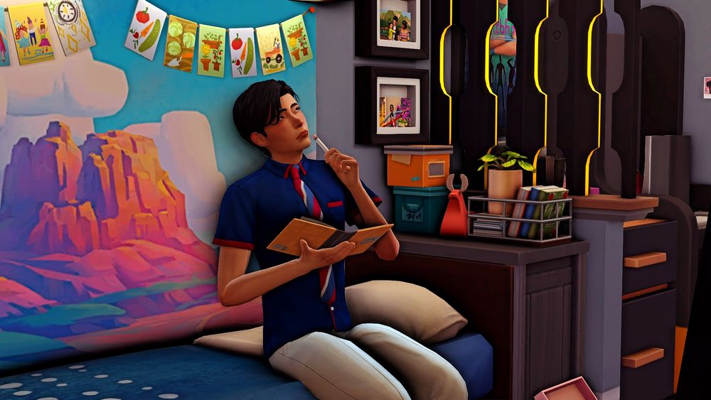 Nate deep in thought while holding a pen and a notebook, sitting on the bed. 