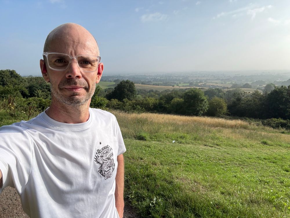 A middle aged baldy man