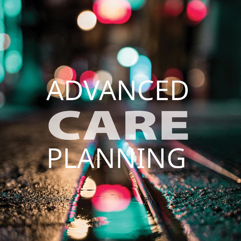 The words "Advanced Care Planning" over a blurred photo of a street at night. 