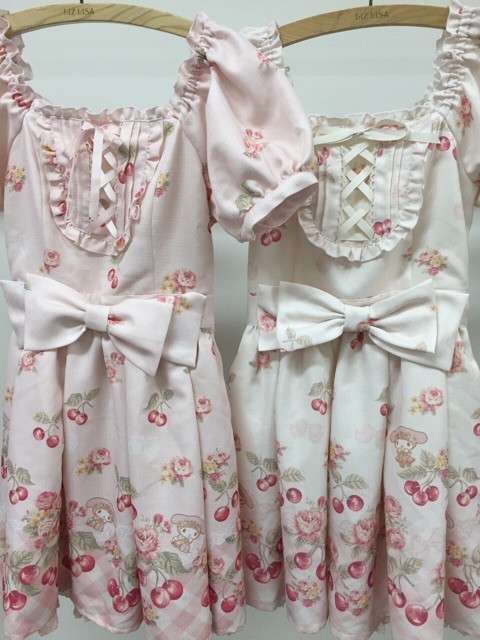 liz lisa x my melody 9th collaboration dresses, pink coloway on the left and white colorway on the right. print is my melody in a pink dress with a flower crown, cherries and pink gingham
