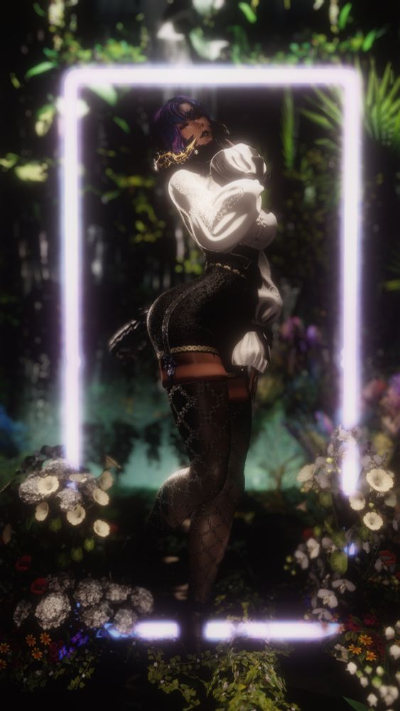 Llehs standing in the middle of a neon frame, flowers and plants adorn the outside of the frame with other plants behind it.