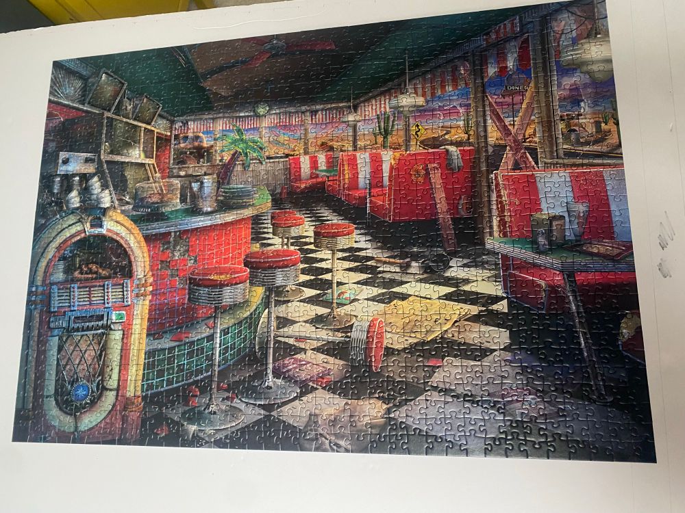 Completed puzzle of a old diner destroyed by time 
