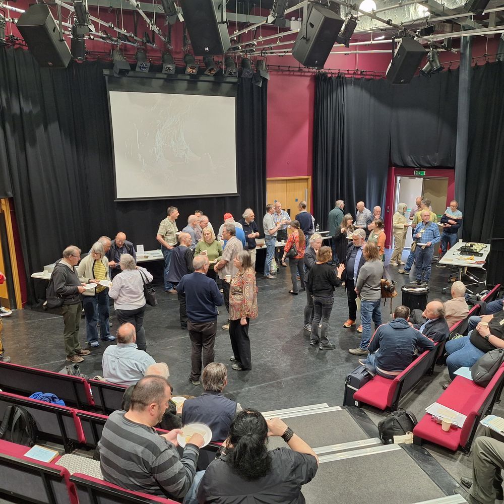delegates eatinf and talking at lunchtime