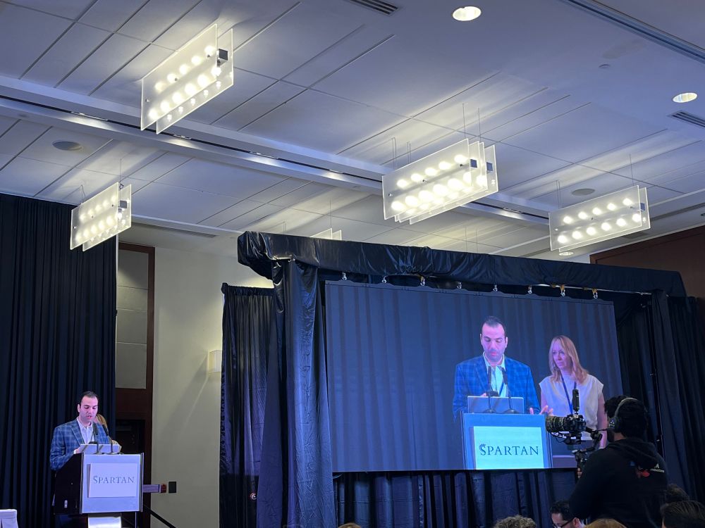 Dr Mohamad Bittar introducing Dr Ruth Napier for the SPARTAN meeting