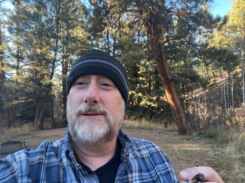 Outside the camper with a blunt enjoying a lovely Colorado sunset.