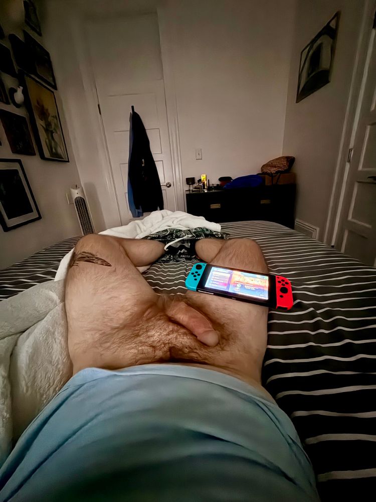 Me with no pants on, dick out, Nintendo switch on thigh. 