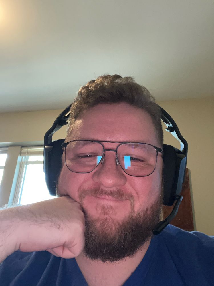 Me smiling with a headset on