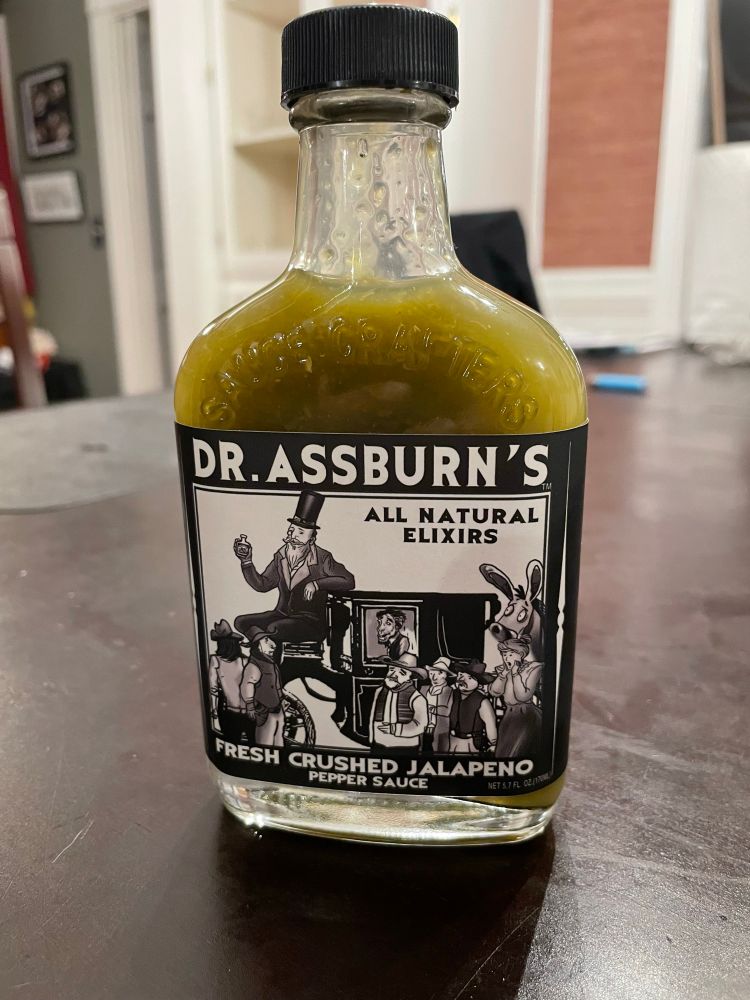 A bottle of Dr. Assburn’s All Natural Elixirs Fresh Crushed Jalapeño Pepper Sauce