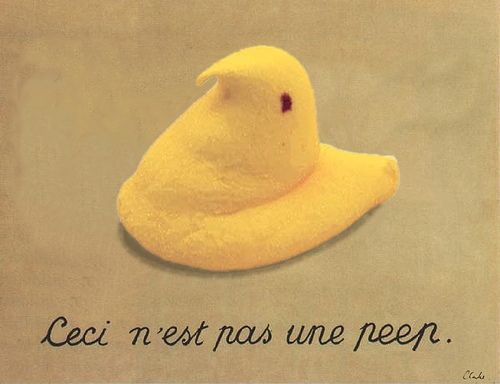 A picture of a marshmallow peep over the French words, "Ceci n'est pas une peep."