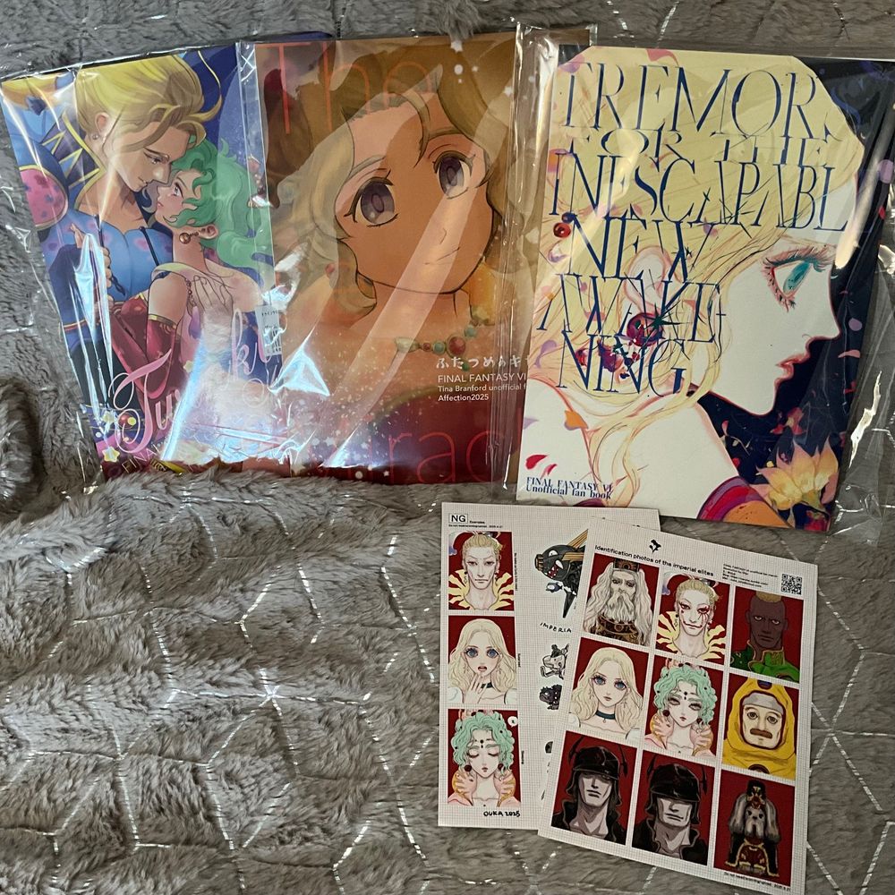 Three Final Fantasy VI fanbooks and some stickers.
