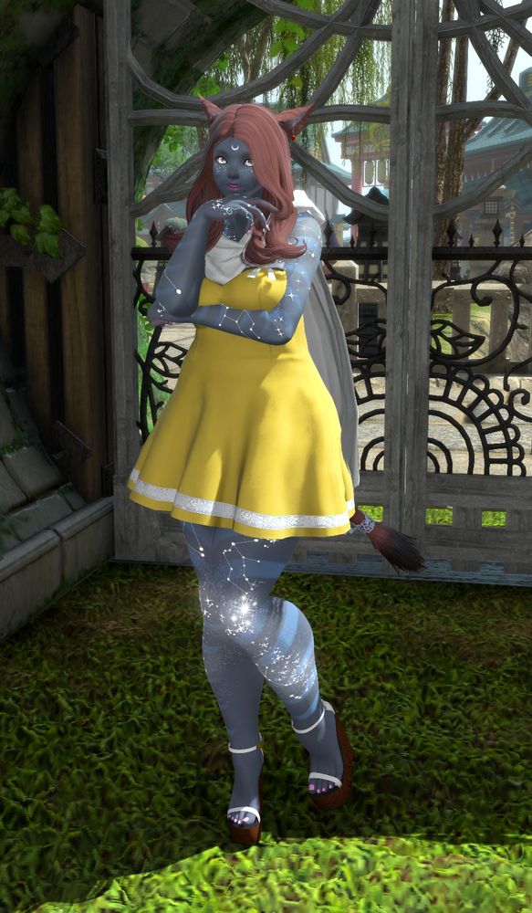 Lura with reddish brown hair and pink lipstick and nail polish in a yellow dress with a white scarf and white wedge sandals. She is dressed as Nana Komatsu from NANA. 