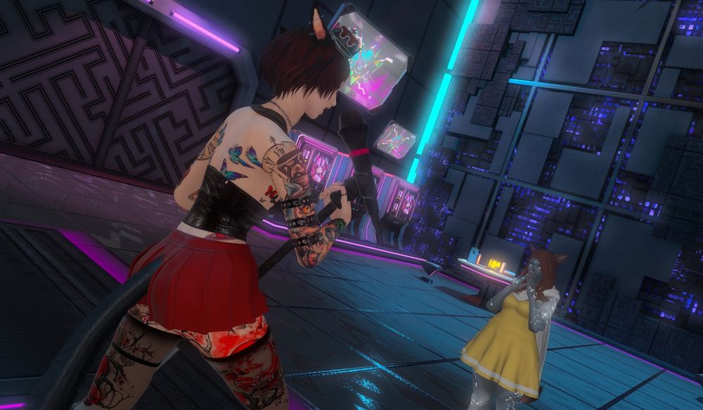 A'qua singing into a microphone while Lura watches enraptured.