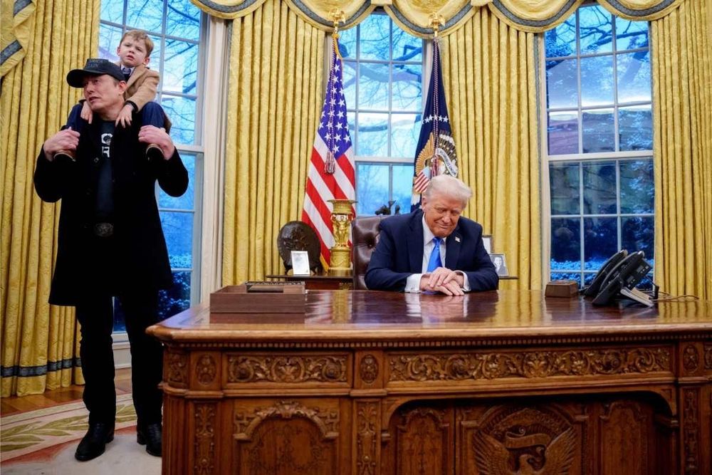 Elmo and the orange guy in the White House