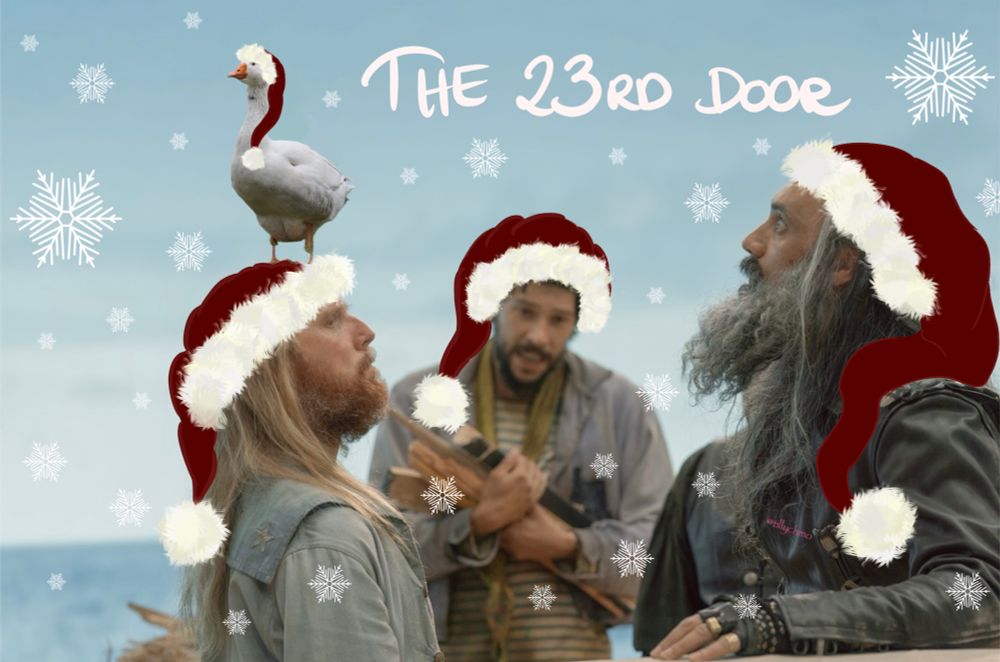 Digitally altered production still of Buttons, ‘Karl’ (except he’s been switched out with a goose), Frenchie, and Ed ‘Blackbeard’ Teach from episode 4 of Season 1 of Our Flag Means Death.

The image has been digitally altered (by @tillychmo – apart from the goose! I don’t know who made the orig. switch-out!) by drawing Santa hats on all four of them (yes, goose included) + adding snowflakes of varying sizes to everywhere but their faces.

(Izzy is technically also in the photo, but he’s so well-hidden behind Ed that I only just realised it right now 🙈😅)

Handwritten text at the top of the image reads:
“THE 23RD DOOR”.