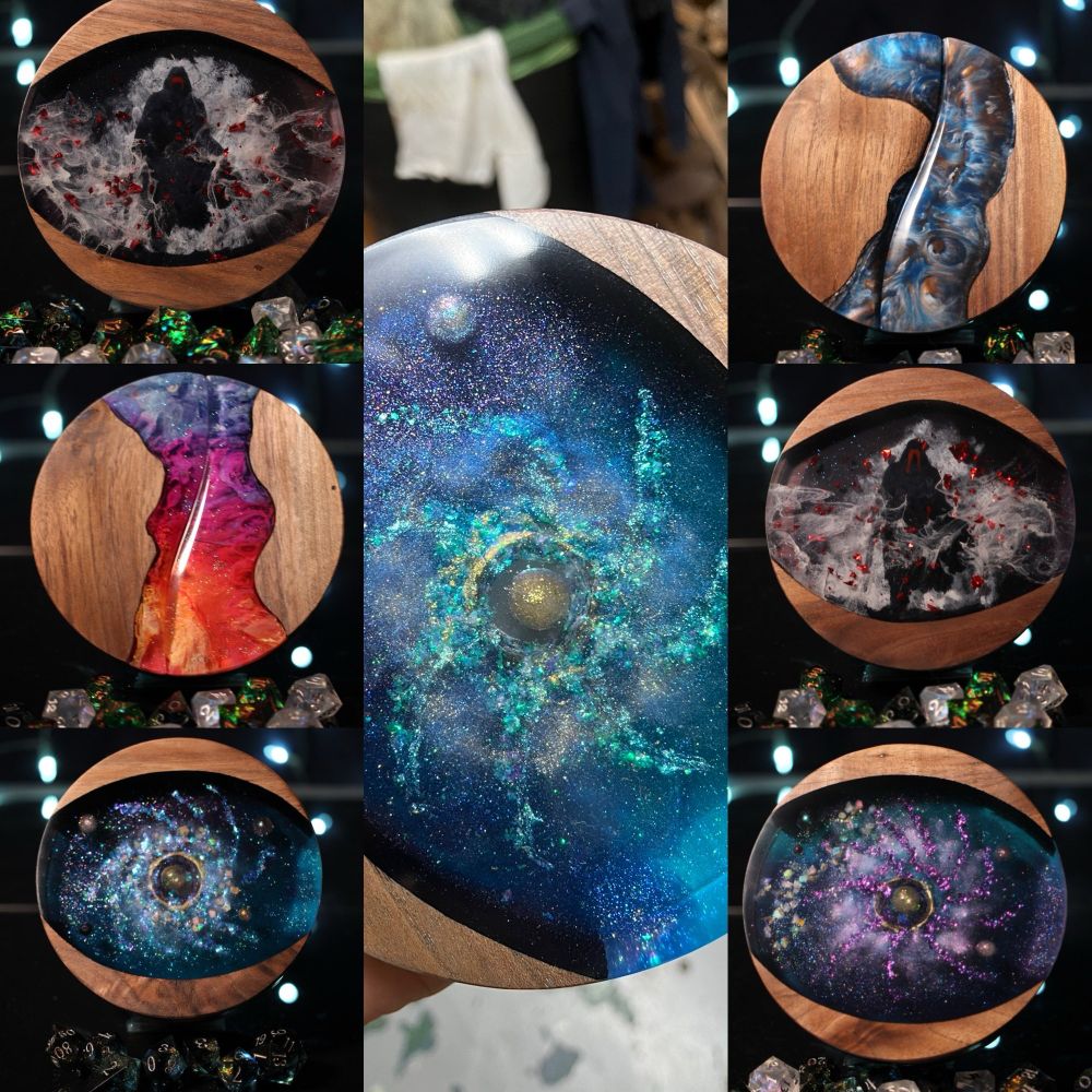 Seven dice boxes with different styles and colors of epoxy incorporated into the tops.