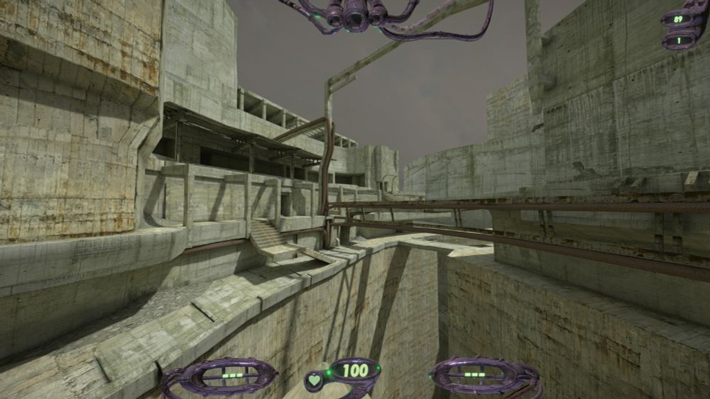 A more utilitarian-looking part of the structure, with pipes snaking their way through the space and a faint rusty brown tinge to some of the walls.