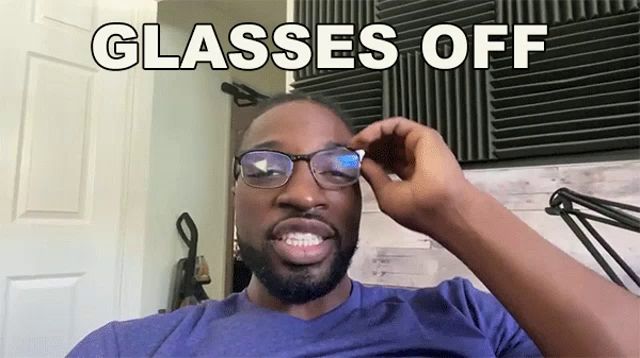 a man wearing glasses with the words " glasses off " written above him