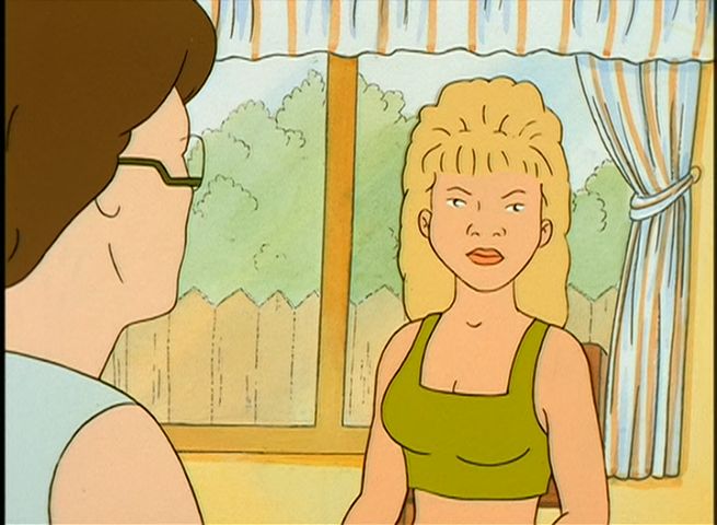 Luanne stares at the "camera."