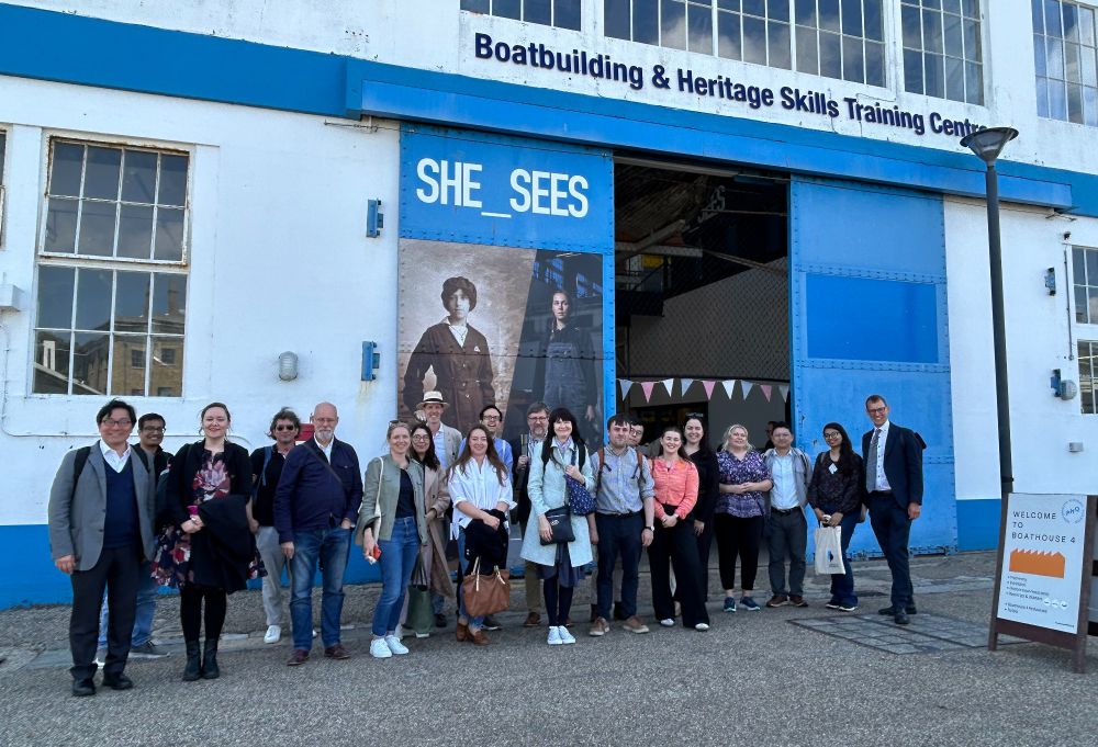 Conference participants visit the SHE_SEES exhibition about women in the maritime sector.