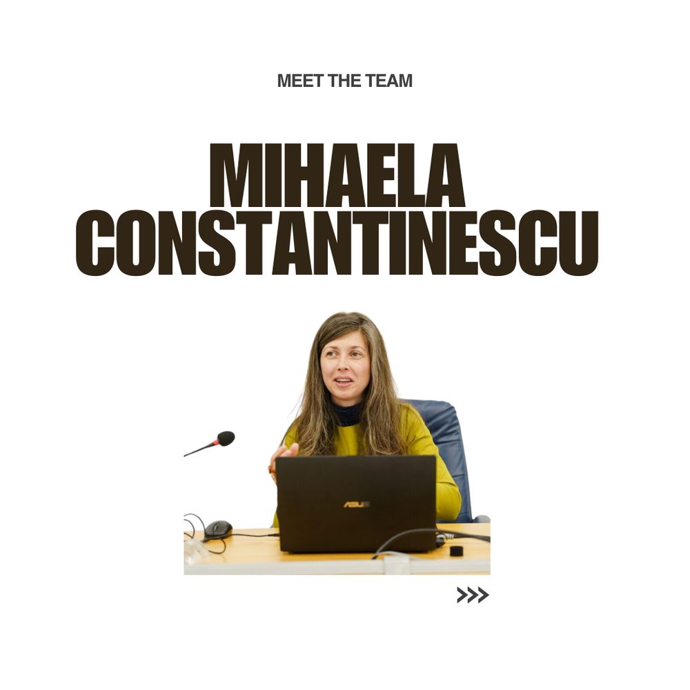 A photograph of Mihaela Constantinescu, CCEA's Executive director sat at a desk, behind a laptop, with a microphone near and talking at a conference. 
