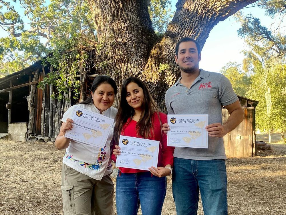 Three Rx One Health Field Institute 2021 course participants holding certificates