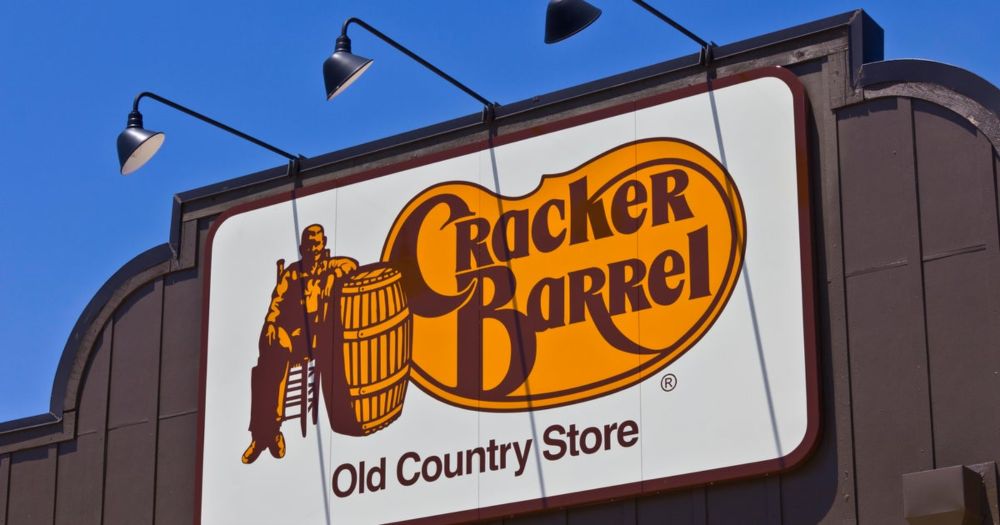 Cracker Barrel stock plunged as much as 15% after the restaurant chain released a new logo that removes its long-time image of a man leaning against a barrel.