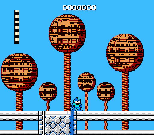 Bomb Man's stage in the original Mega Man. The concept art imply the orbs to be a futuristic architecture, with the song itself implying it's set somewhere up high. Bomb Man would have a great vantage point from this up high to chuck bombs downwards where he could see most buildings.