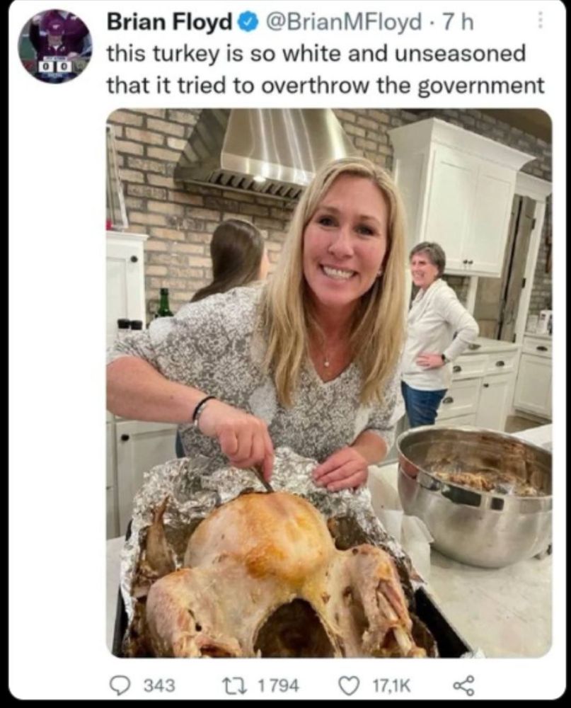 Photo of MTG and her turkey captioned 'this turkey is so white and unseasoned that it tried to overthrow the government.'