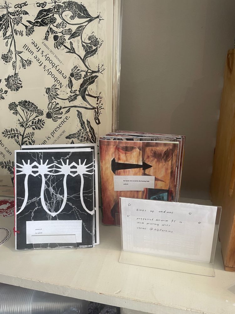 bookstore display of print copies of science art and the family tree