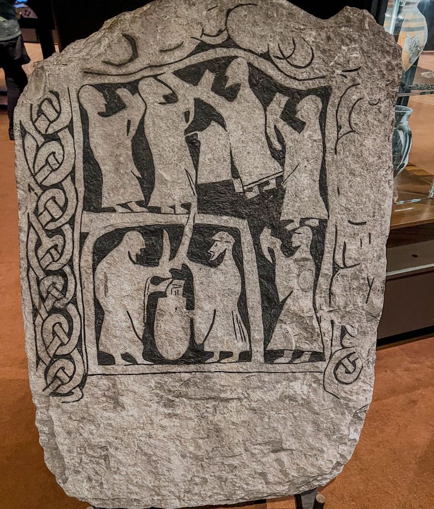 A picture stone depicting Vikings drinking and fighting. From early Vendel/Viking period, found on Gotland.