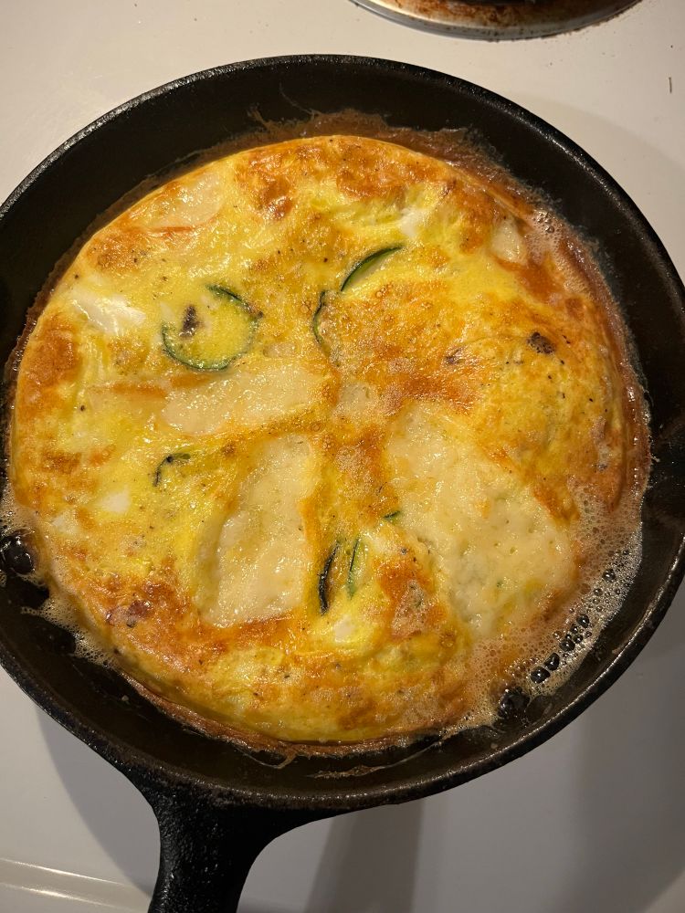 Zucchini and manchego frittata in a pan
