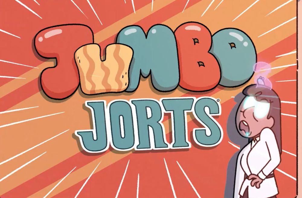 Frame from an episode of the cartoon Hilda, with a zombified woman standing in front of a boardroom projector screen, with the logo for “Jumbo Jorts” within a sort of starburst background, projected on screens 