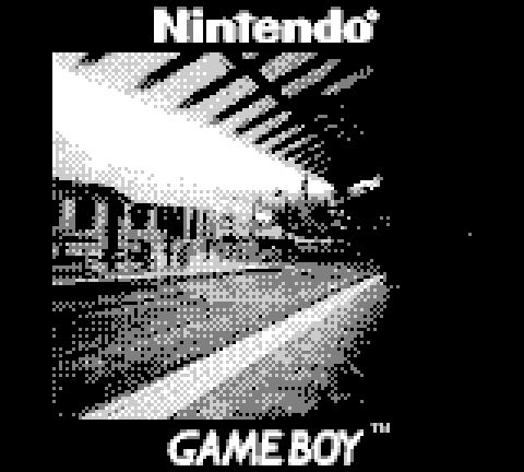 Low resolution image of an outdoor train station sitting area and the tracks. 