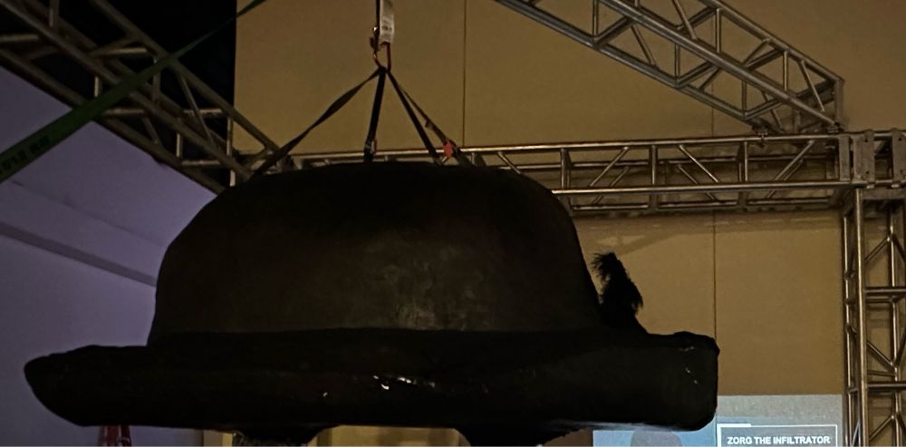 A giant top hat.  The hat is worn by two people to control the game Haber Dasher.