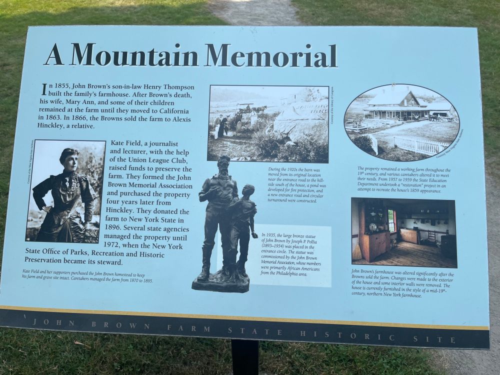 Exhibit plaque from the John Brown Farm detailing the origins of the farm as a public history venue.