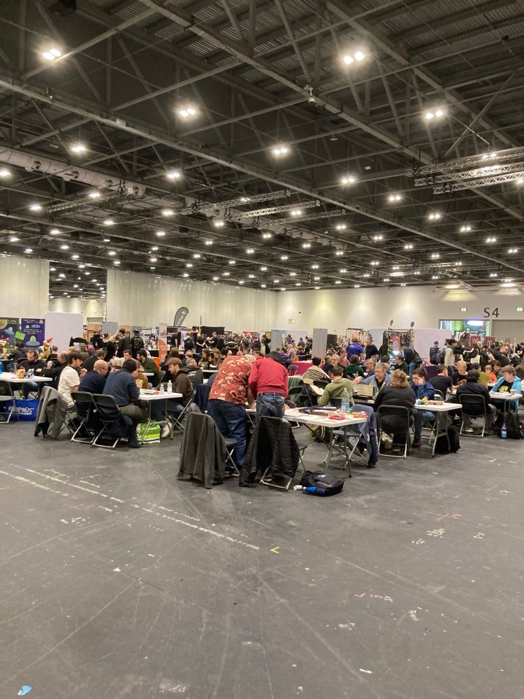 Photograph of one corner of packed trade hall at Dragonmeet.