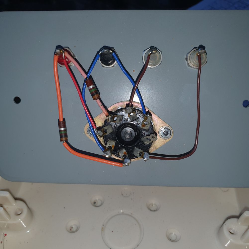 pins of the socket of the magic eye valve. Two resistors soldered in place