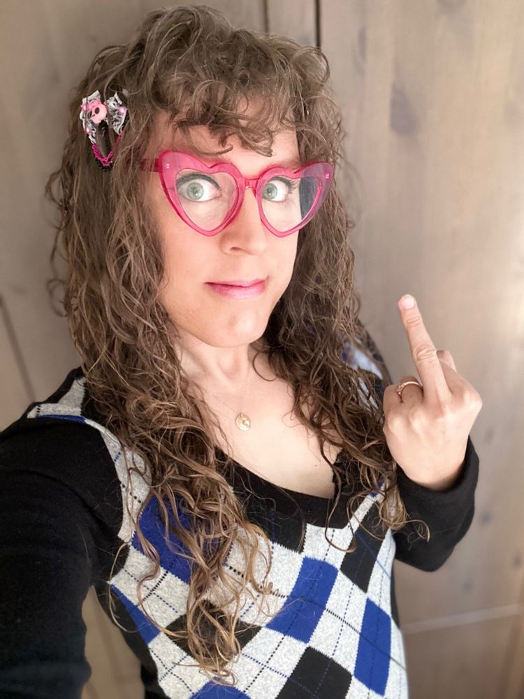 it’s me, smiling and giving the middle finger