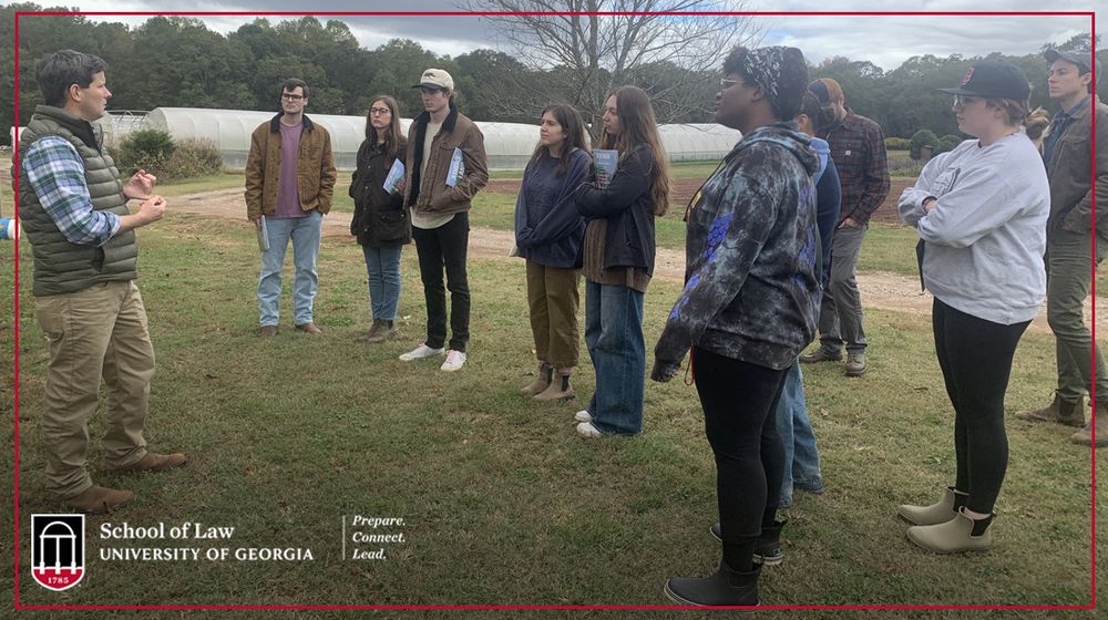 Image shows students with the law school’s Land Conservation Clinic during their recent site visit to Woodlawn Gardens Farm, where they learned about programs to support farm conservation easements.