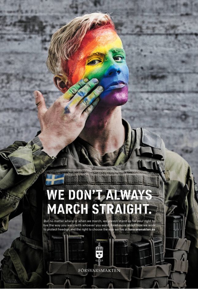 Engelskspråkig rekryteringsaffisch från Försvarsmakten som visar en svensk soldat med regnbågsfärgad ansiktsmålning och texten ”We don’t always march straight”.