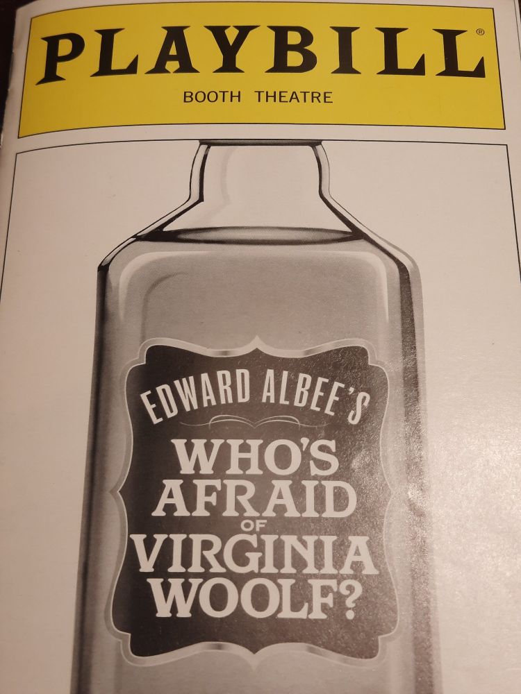 The cover for the play Who is Afraid of Virginia Woolf from November 2012 at the Booth Theatre in NYC.  This image is of a liquor bottle with the play title on the label and the playwright, Edward Albee above.