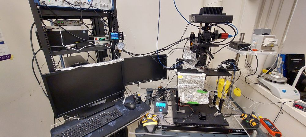A microscope with dozens of cables emerging from every location.