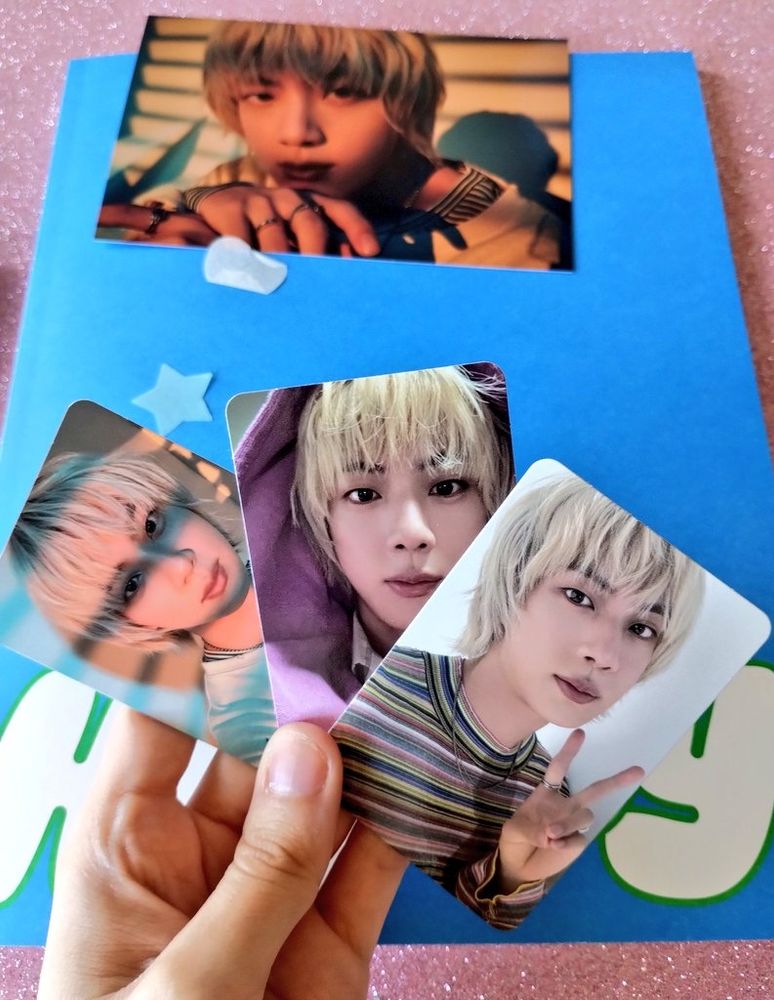 Jin blue album navigate 
with his photo cards