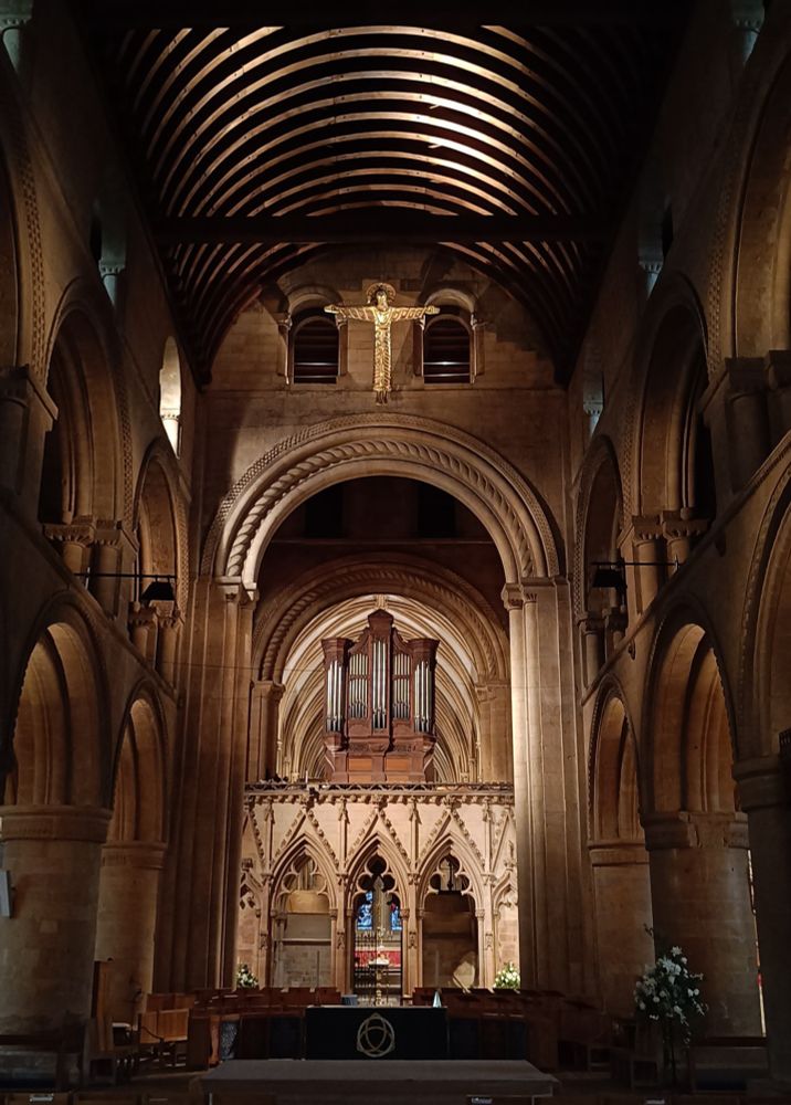 The nave of Southwell Minster looking east, the pulpitum and the organ above
