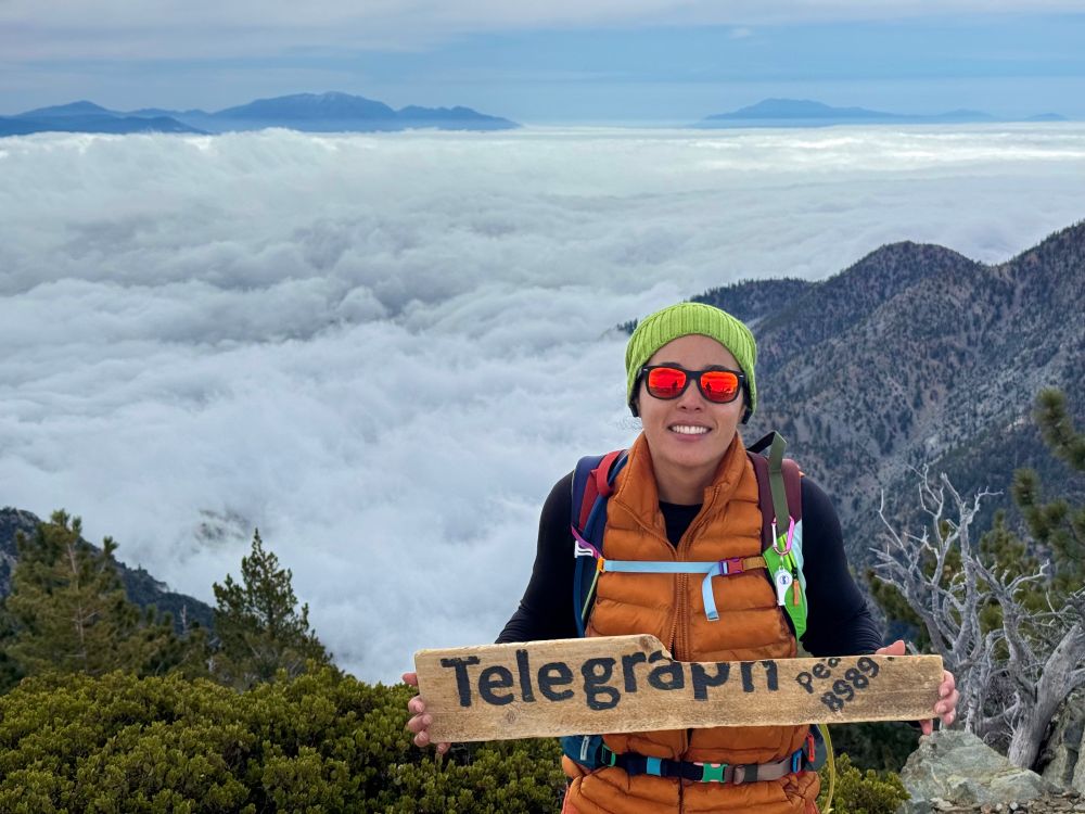 Me hiking a sign at Telegraph Peak